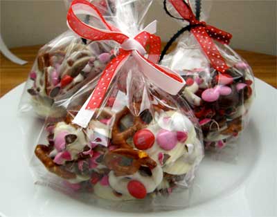 Tie a red ribbon around this bag of treats. Pretzels and M & M's are fun to include in cello bags.