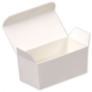 Small white ballotin candy boxes filled with fudge are great gifts.